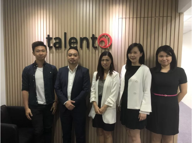 Group photo of staff in HK Office